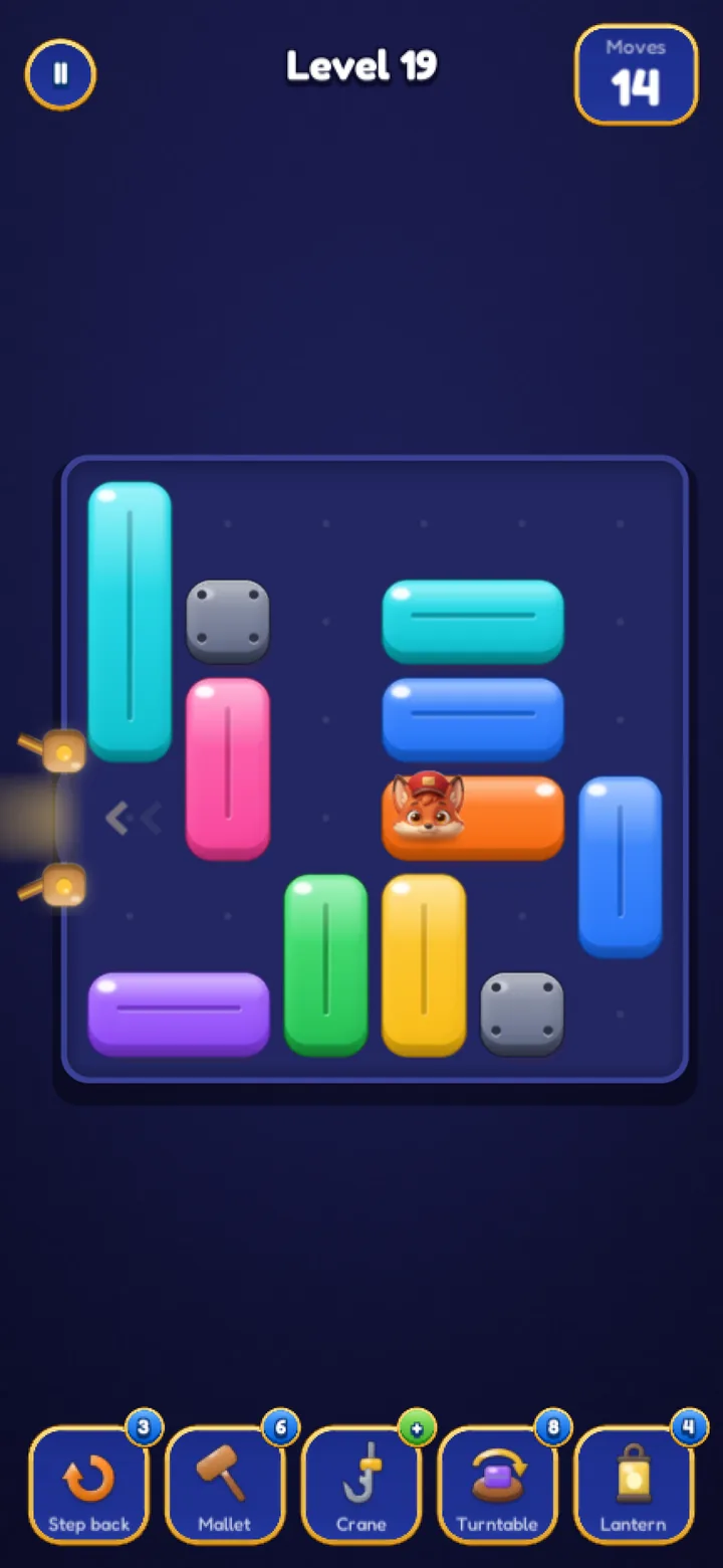 A board with long crates and two grey rocks.